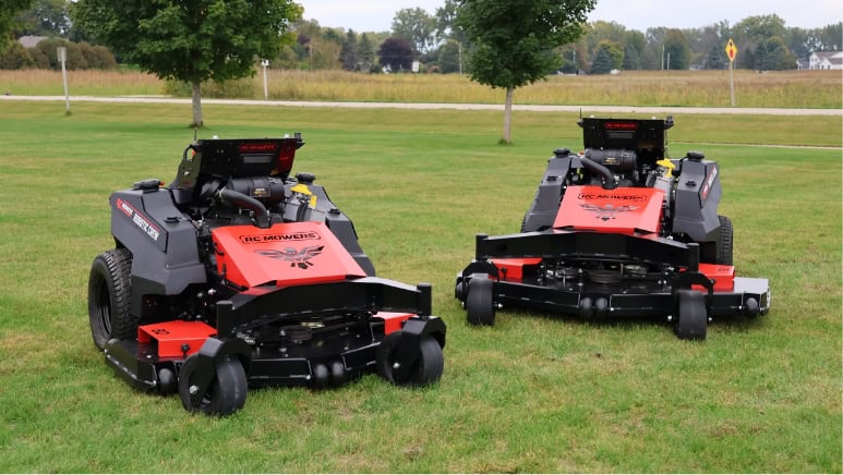 Two RECONX mowers in open field